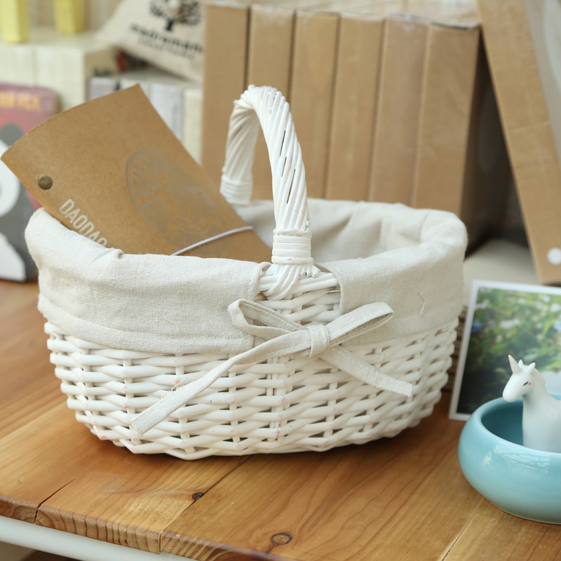 Set of 3 white oval storage baskets
