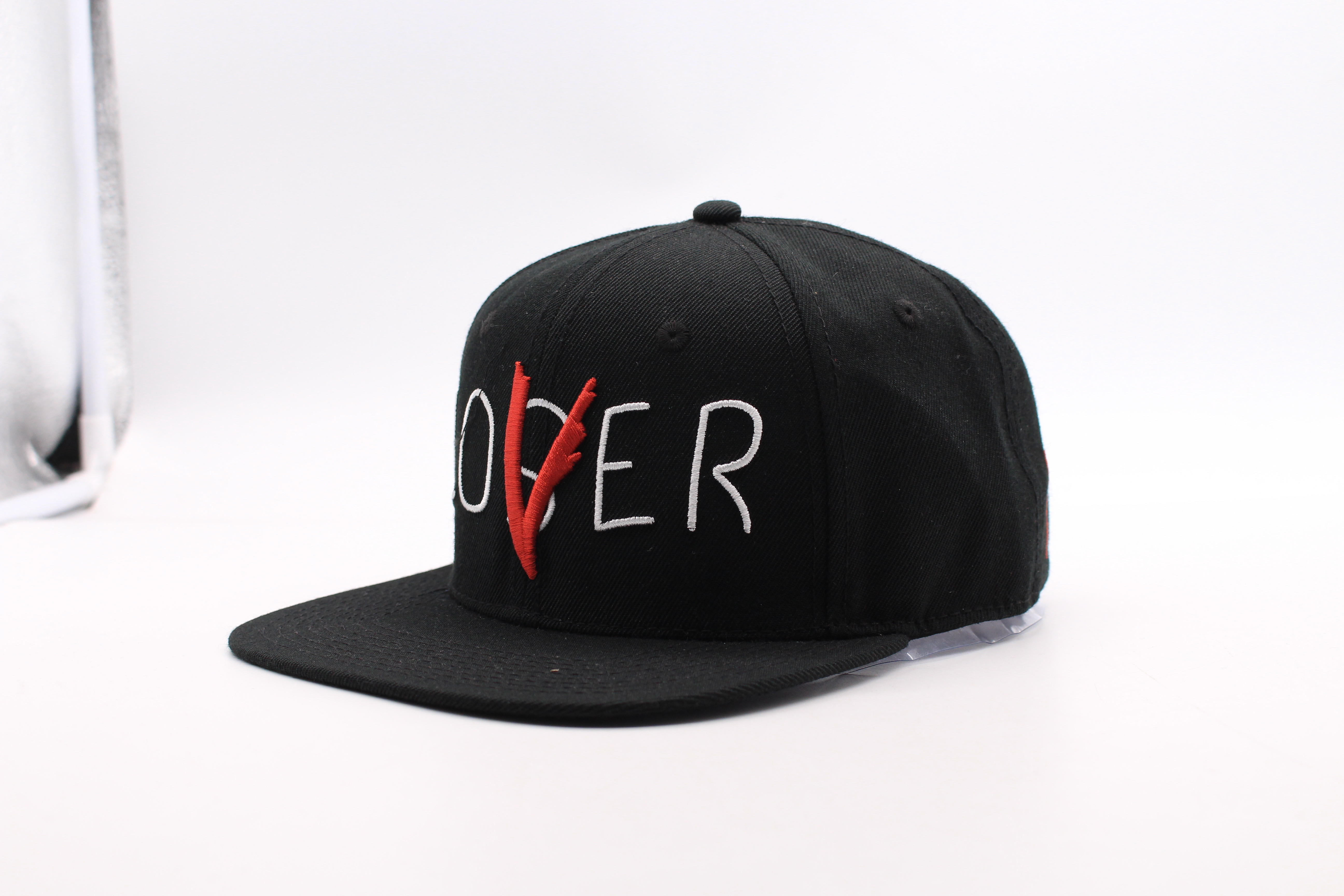 Men's peaked cap with embroidery