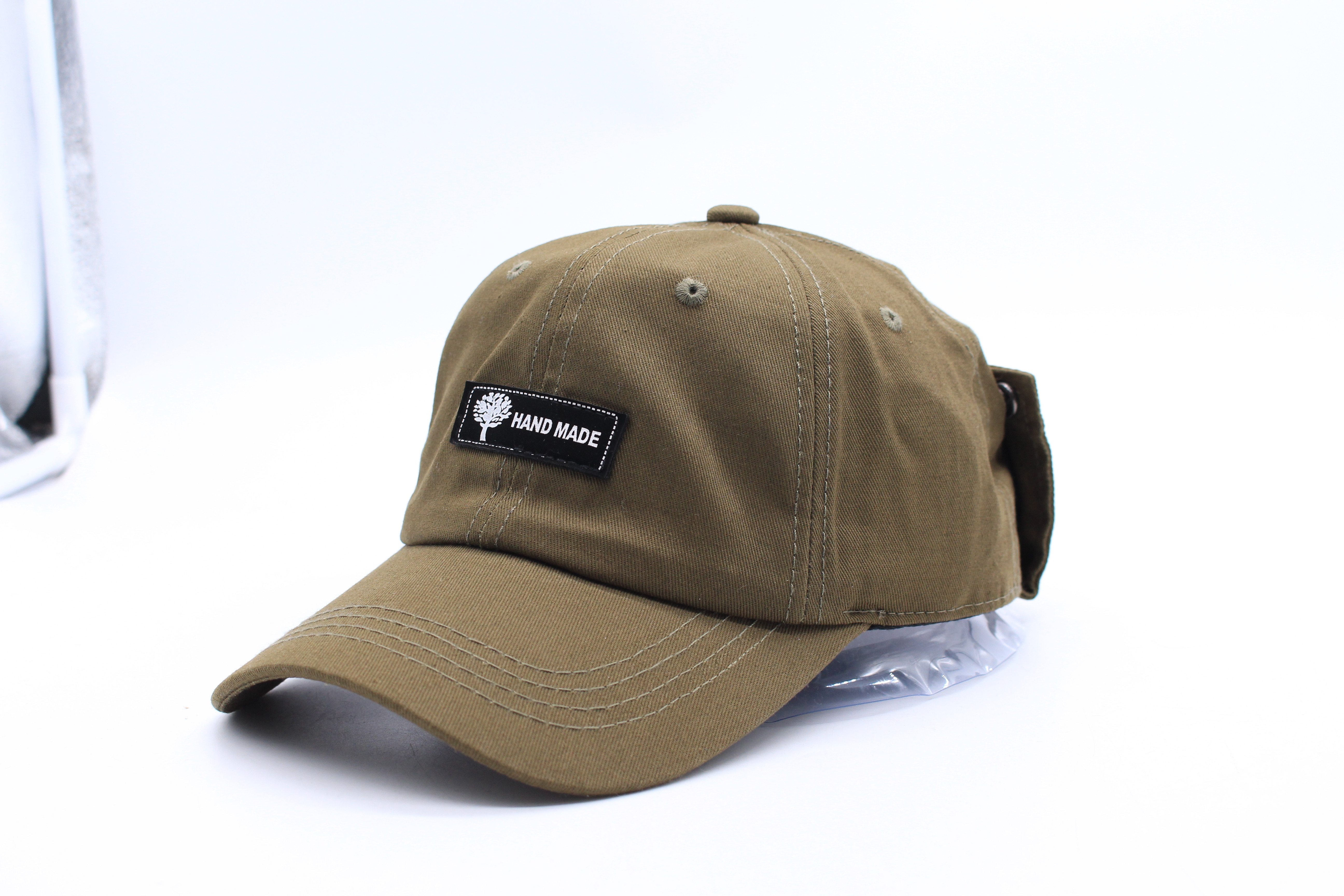 Men's peaked cap with glass