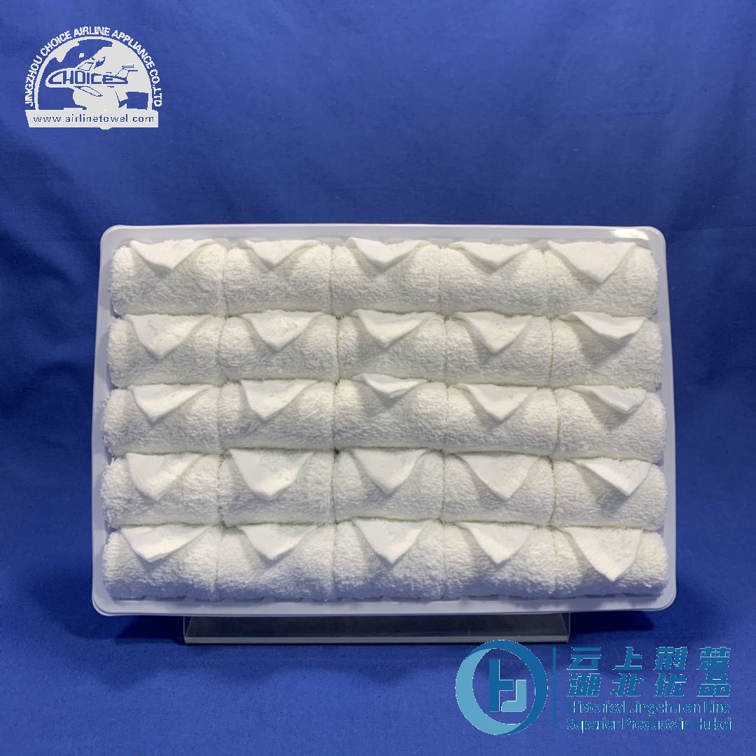 Disposable premium cotton white rolled oshibori in tray